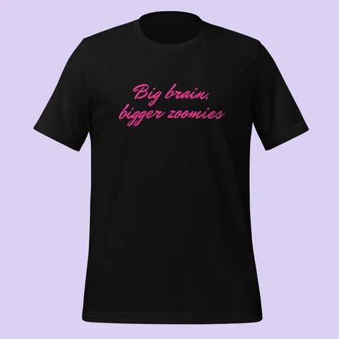 Black tee with "Big brain, bigger zoomies" hand-signed across the chest